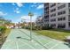 Enjoy outdoor recreation with this shuffleboard court and manicured landscaping near the building at 232 Saint Augustine Ave # 207, Venice, FL 34285