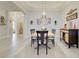 Spacious dining room with tile floors and decorative lighting at 23415 Waverly Cir, Venice, FL 34293
