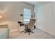 Bright office with desk, chair and closet, provides a productive workspace at 23415 Waverly Cir, Venice, FL 34293