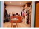 Spacious walk-in closet with custom shelving, organized storage, and room for ample wardrobe at 23495 Altman Ave, Punta Gorda, FL 33980