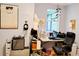 Functional home office with desk, computer, and music equipment, offering a creative workspace at 23495 Altman Ave, Punta Gorda, FL 33980