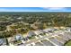 Aerial view of the community showcasing the home's location, lush surroundings and neighborhood layout at 2572 Averland Loop, North Port, FL 34287