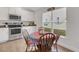 Charming breakfast nook illuminated by natural light, perfect for casual dining at 2572 Averland Loop, North Port, FL 34287