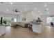 Open-concept living space featuring a living room, breakfast bar and a view to the kitchen at 2572 Averland Loop, North Port, FL 34287