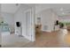 Inviting living area leads to dining space with stylish decor and furnishings at 2572 Averland Loop, North Port, FL 34287