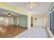 Sunny Florida room with tile flooring and multiple access points at 454 Cerromar Rd # 174, Venice, FL 34293