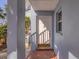 Charming front door with brick entryway and well-maintained exterior, creating inviting curb appeal at 454 Cerromar Rd # 174, Venice, FL 34293