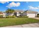 Charming single-story home with manicured lawn and well-maintained landscaping at 5106 Pine Shadow Ln, North Port, FL 34287