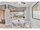 Charming breakfast nook with views of the pool and golf course at 5109 Pine Shadow Ln, North Port, FL 34287