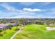 Picturesque view of the golf course, blending seamlessly with the residential landscape at 5109 Pine Shadow Ln, North Port, FL 34287