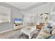 Open-concept living space featuring modern decor and seamless flow into dining area at 5109 Pine Shadow Ln, North Port, FL 34287