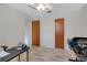 Bright bedroom with wood-look flooring and neutral walls for a calming atmosphere at 5875 Jackson, Venice, FL 34293