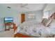 Well-lit bedroom with a ceiling fan and a comfortable bed at 5875 Jackson, Venice, FL 34293