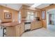 Kitchen featuring countertop seating, tile floors, natural light and seamless connectivity to outdoor spaces at 5875 Jackson, Venice, FL 34293