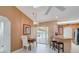 Bright eat-in kitchen with a breakfast bar, tile flooring, and sliding doors to the pool area at 5875 Jackson, Venice, FL 34293