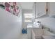 Functional laundry room with washer, dryer, and utility sink at 5875 Jackson, Venice, FL 34293