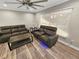 Cozy living area with a large window, sleek floors and comfortable seating at 605 Cumberland Rd, Venice, FL 34293