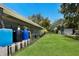 Large backyard with a covered porch and garden at 651 Percheron Cir, Nokomis, FL 34275