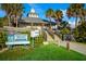 Nokomis Beach entrance featuring refreshments, restrooms, and wooden stairways under a sunny blue sky at 651 Percheron Cir, Nokomis, FL 34275