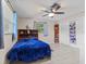 Bedroom with tiled floors and a large closet at 651 Percheron Cir, Nokomis, FL 34275