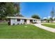 This lovely single-story home boasts stone accents, fresh landscaping, and an extra wide driveway at 651 Percheron Cir, Nokomis, FL 34275