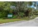 The Culverhouse Nature Park entrance featuring greenery, plants, and a trail at 651 Percheron Cir, Nokomis, FL 34275