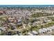 Scenic aerial view of a coastal community with residential areas and convenient access to nearby commercial centers at 742 Golf Dr, Venice, FL 34285