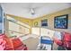 Screened-in patio featuring comfortable seating, decor and plenty of light at 742 Golf Dr, Venice, FL 34285