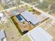 Overhead view of the property highlighting the backyard pool, lush landscaping, and overall layout at 771 Stewart St, Englewood, FL 34223