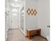 Bright bathroom with a vanity, shower with a glass door, and a bench at 771 Stewart St, Englewood, FL 34223