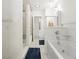 Clean and modern bathroom with a soaking tub and separate shower at 771 Stewart St, Englewood, FL 34223