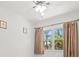 Bedroom with natural light and a ceiling fan at 771 Stewart St, Englewood, FL 34223