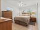 Bright bedroom with a ceiling fan and traditional furnishings at 771 Stewart St, Englewood, FL 34223