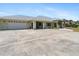 A generously sized driveway and multi-car garage offering ample parking space at 771 Stewart St, Englewood, FL 34223