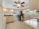 Spacious open kitchen with modern appliances and ample cabinet storage at 771 Stewart St, Englewood, FL 34223