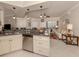 Modern kitchen with granite counters, stainless steel appliances, and an open layout at 800 Gardens Edge Dr # 814, Venice, FL 34285