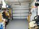Spacious garage with ample storage and a neutral-colored floor at 8155 Mossborger Ave, North Port, FL 34287