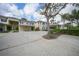 Well-maintained condo community featuring carports, lush landscaping, and inviting residential buildings at 819 Montrose Dr # 204, Venice, FL 34293