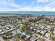 Aerial view of a coastal community, showcasing the property's location near the ocean and local amenities at 929 The Rialto, Venice, FL 34285