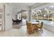 Sunny breakfast nook with seamless access to the pool area, perfect for indoor-outdoor living at 945 Chickadee Dr, Venice, FL 34285