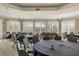 Spacious event space with tables and chairs, perfect for gatherings and meetings at 945 Chickadee Dr, Venice, FL 34285