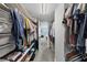 Walk-in closet provides ample storage with built-in shelving for organization at 101 S Gulfstream Ave # 15H, Sarasota, FL 34236