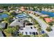 Aerial view of real estate featuring amenities including a pool and tennis court at 1022 Yosemite Dr, Englewood, FL 34223