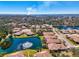 Aerial view of the community, highlighting the homes and surrounding lakes and landscape at 1022 Yosemite Dr, Englewood, FL 34223