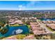 Overhead real estate view with a lake featuring a fountain in a desirable community at 1022 Yosemite Dr, Englewood, FL 34223