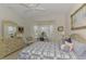 Bright and airy bedroom featuring a bay window and coordinated furnishings at 1022 Yosemite Dr, Englewood, FL 34223