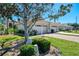 Charming villa with an attached garage and a brick-paved driveway at 1022 Yosemite Dr, Englewood, FL 34223