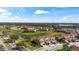 Beautiful aerial view featuring the community's design with water features and lush surroundings at 1050 Jonah Dr, North Port, FL 34289