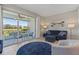 Relaxing living room with comfortable seating and sliding glass doors opening to screened lanai with water view at 1050 Jonah Dr, North Port, FL 34289
