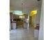 Bright kitchen with tile flooring, ample counter space, and built-in appliances at 111 2Nd St, Nokomis, FL 34275